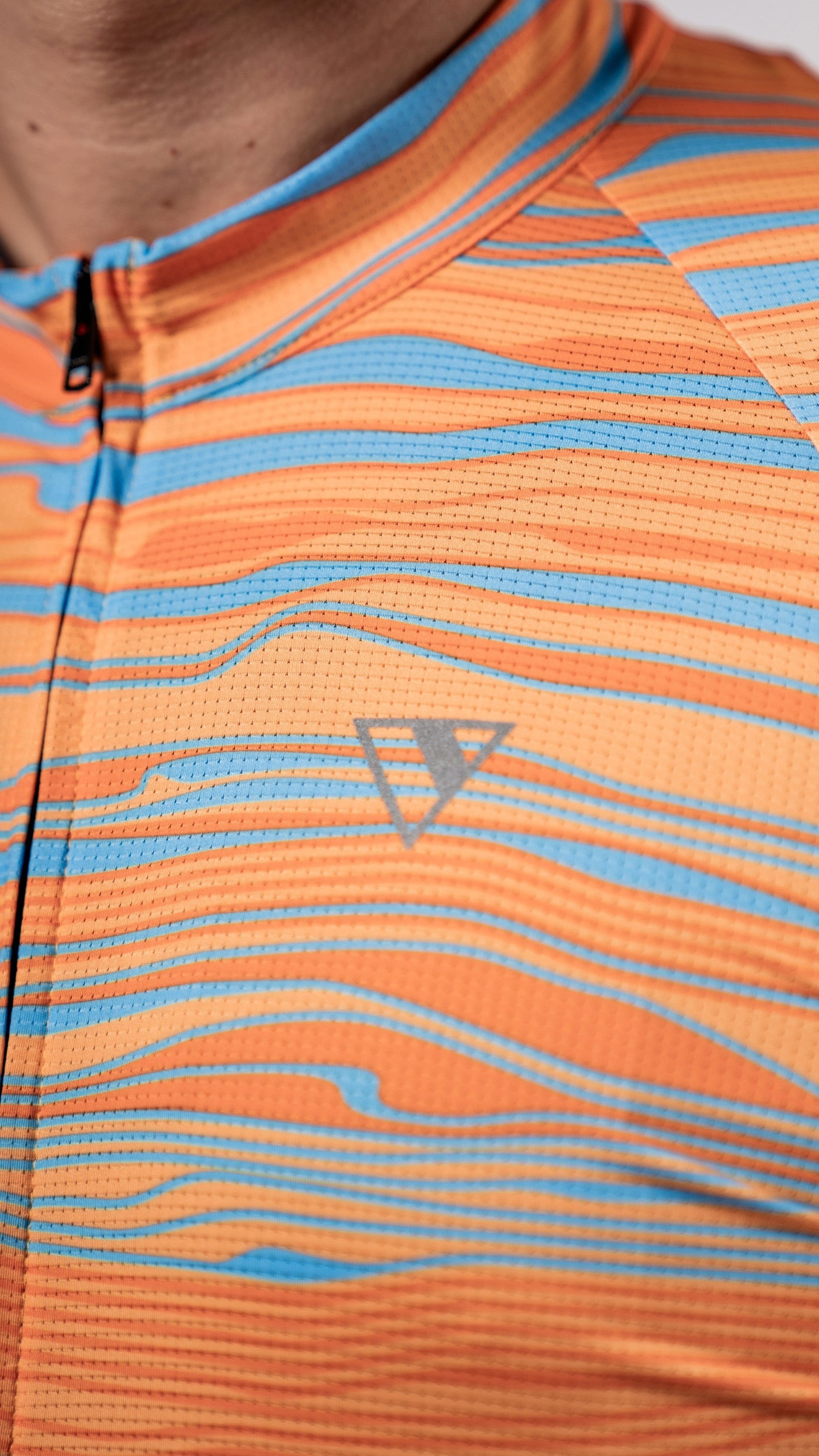 Close up of the Varlo chest logo on the pioneer cycling jersy in the new 2025 gravel series.