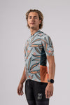 Male model posing in studio in the new 2025 pioneer gravel cycling jersey from the design team at Varlo.