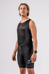Studio front side view of male model in the new mens roam cargo cycling bib from 2025 gravel series. 