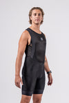 Studio male model shoot in the Varlo mens roam cargo cycling bib in pulse purple.